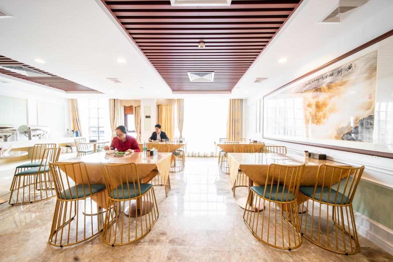Zhongbo Art Hotel Canton Esterno foto